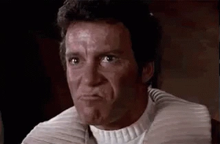 A gif of Captain Kirk, played by William Shatner, screaming KHAN into a communicator